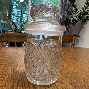 Clear cut lidded glass storage jar